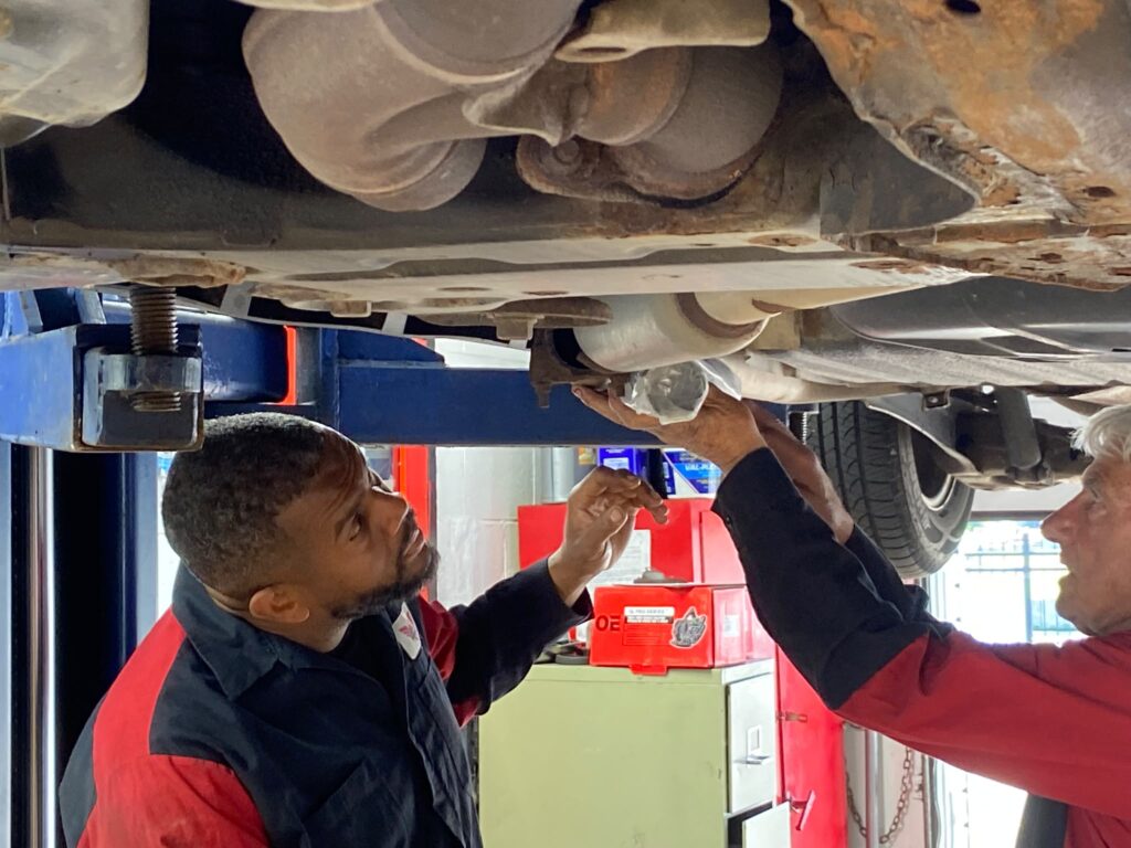 The Mechanics Inspecting a Exhaust Change The Mechanics Inspecting a Exhaust Change